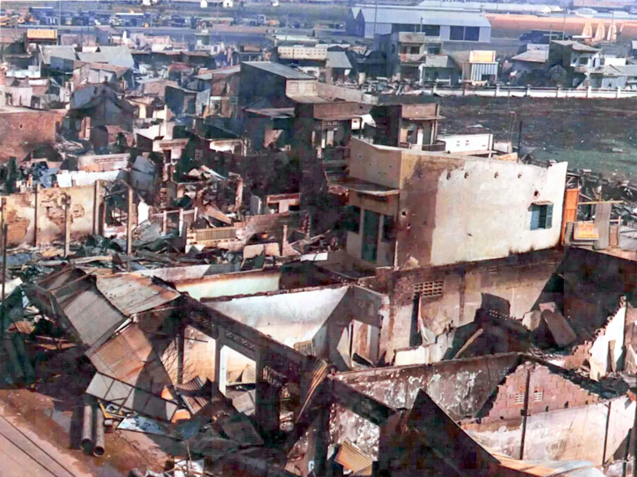 This picture shows few buildings and we see few collapsed buildings.