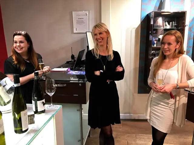 As we can see in the image there is a wall, photo frame, shelves, tables and on tables there are...